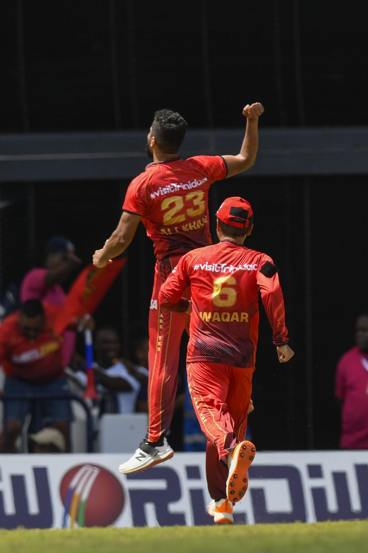 Ali Khan (L) and Waqar Salamkheil (R) of Trinbago Knight Riders celebrate their team’s defeat of the Jamaica Tallawahs yesterday in the Men’s 2023 Republic Bank Caribbean Premier League match in Bridgetown, Barbados. (Photo by Randy Brooks/CPL T20 via Getty Images)