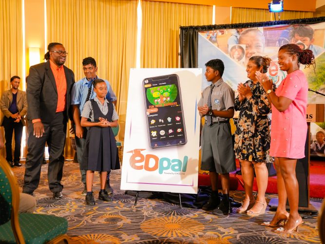 Launching of app: Minister of Education Priya Manickchand is second from right. NCERD Head Quenita Walrond is at right. (Ministry of Education photo)