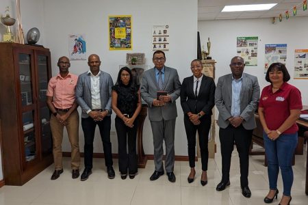 Guyana’s Ambassador
to Cuba Halim Majeed, centre, flanked on his right
by Garfield Wiltshire, Godfrey Munroe, Vidushi Persaud-McKinnon, Cristy Campbell, Steve Ninvalle and Emelia Ramdhani.