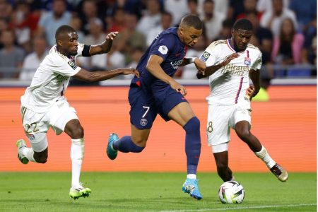 Kylian Mbappe, centre attempts to evade two of his markers. (Reuters photo)