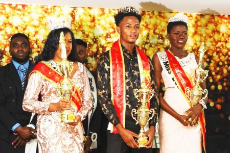 Reshma Seemangal (left) and Anthonio Johnson (centre) after winning the Miss and Mr Deaf Guyana pageant in 2022