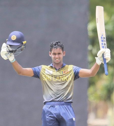 Pulundi Perera celebrates his match winning century yesterday.
