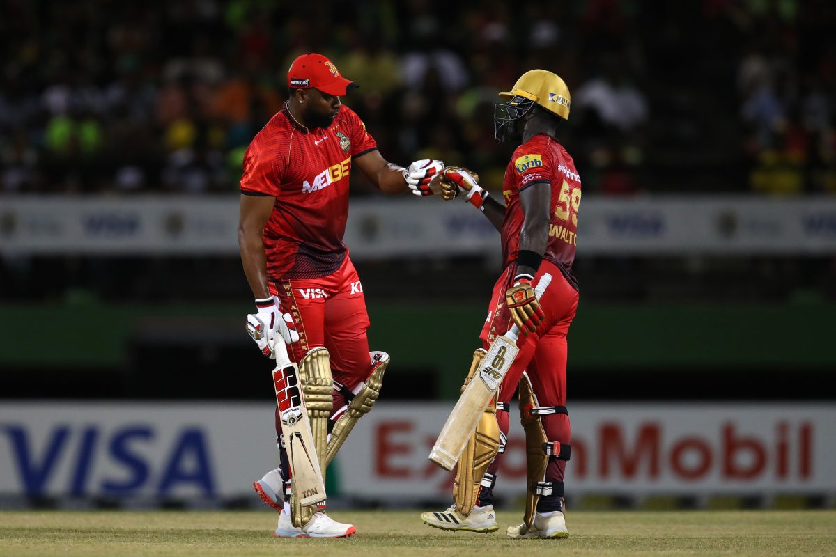 Kieron Pollard (left) and Chadwick Walton put on 66 runs for the third wicket