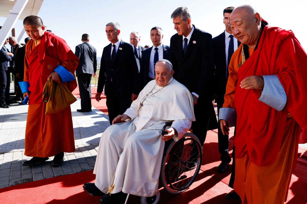 Gabju Demberel Choijamts, the abbot of the Buddhists’ Gandantegchinlen Monastery, walks next to Pope Francis to attend an ecumenical and interreligious meeting at the Hun Theatre, during his Apostolic Journey in Ulaanbaatar, Mongolia September 3, 2023. REUTERS