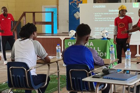 FIFA Instructor Natasha Lewis uses participant Ebo McNeil during a demonstration.
