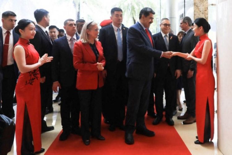 Venezuela’s President Nicolas Maduro greets a person after arriving with his wife Cilia Flores in Shenzen in this undated Handout photo made available on September 8, 2023. — Miraflores Palace handout pic via Reuters