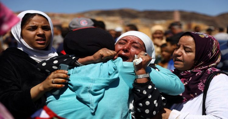 People react during the funeral of two victims of the deadly earthquake, in Moulay Brahim, Morocco, September 10, 2023. (Reuters photo)