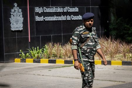A security personnel stands guard outside the Canadian High-Commision in New Delhi, India, September 19, 2023. REUTERS/Adnan Abidi