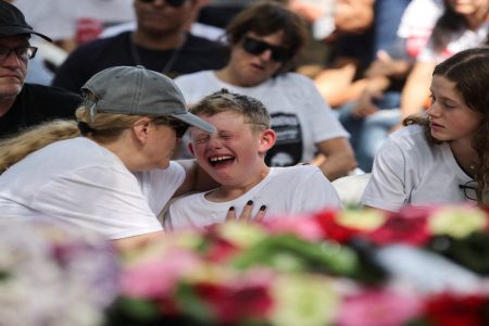 Shahar, 9, the brother of Maayan Idan, 18, who was killed following a deadly infiltration by Hamas gunmen in kibbutz Nahal Oz, and son of Tzahi who was kidnapped to the Gaza Strip, reacts during Maayan’s funeral in kibbutz Einat, Israel October 22, 2023 REUTERS/Tomer Appelbaum Acquire Licensing Rights