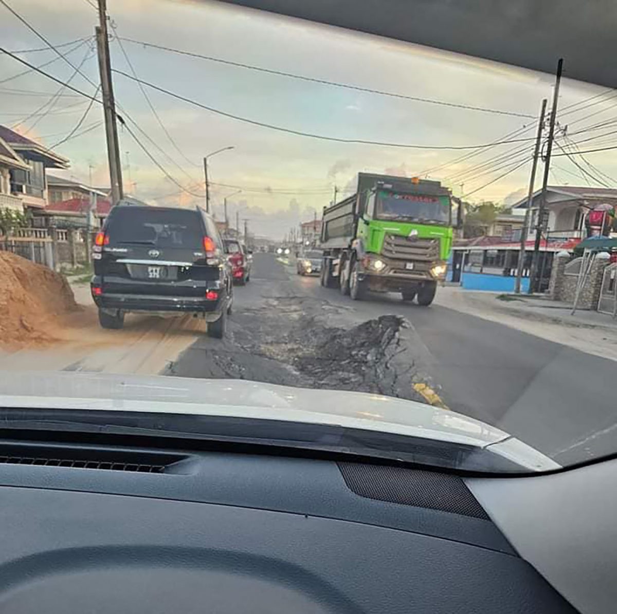 The bulge that formed on the Grove Public Road, East Bank Demerara yesterday.
