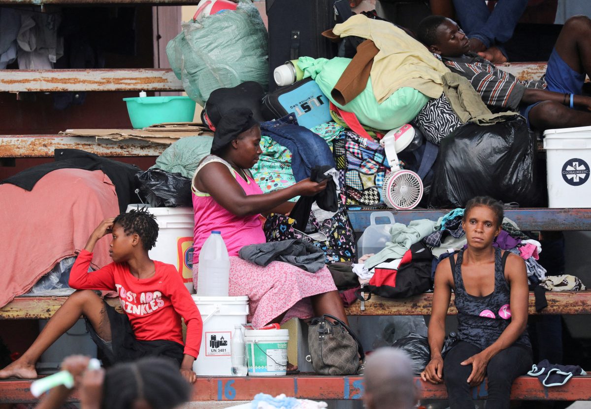 FILE PHOTO: People fleeing gang violence take shelter at a sports arena, in Port-au-Prince, Haiti September 1, 2023. REUTERS/Ralph Tedy Erol/File Photo