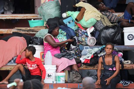 FILE PHOTO: People fleeing gang violence take shelter at a sports arena, in Port-au-Prince, Haiti September 1, 2023. REUTERS/Ralph Tedy Erol/File Photo