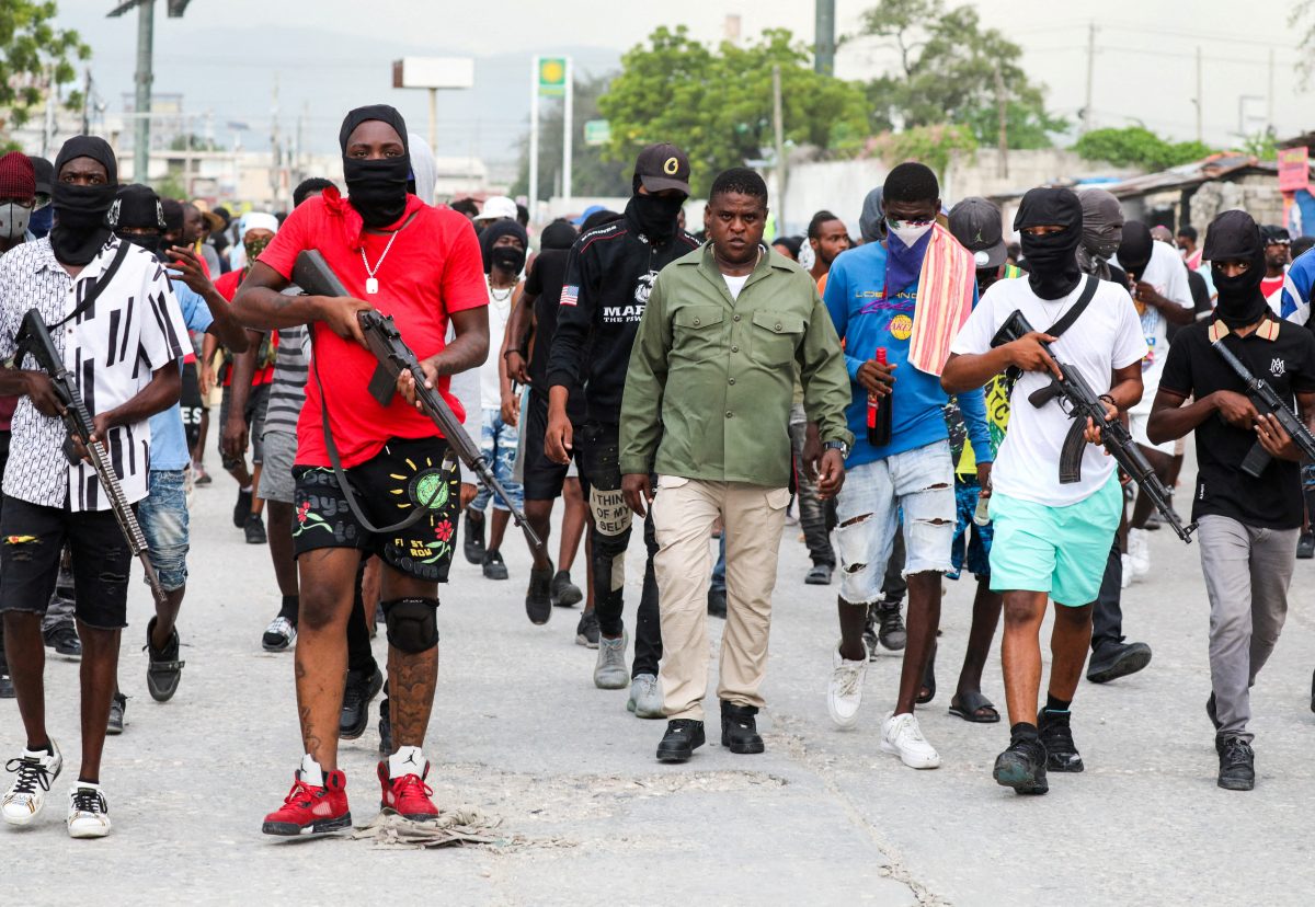 Former police officer Jimmy “Barbecue” Cherizier, leader of the ‘G9’ coalition, leads a march surrounded by his security against Haiti’s Prime Minister Ariel Henry, in Port-au-Prince, Haiti September 19, 2023. REUTERS/Ralph Tedy Erol     TPX IMAGES OF THE DAY