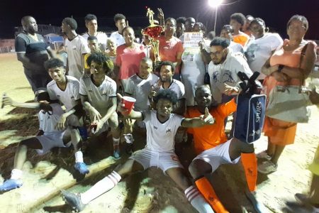 Beacons celebrate after winning the ‘Rats’ Memorial Football Championship.