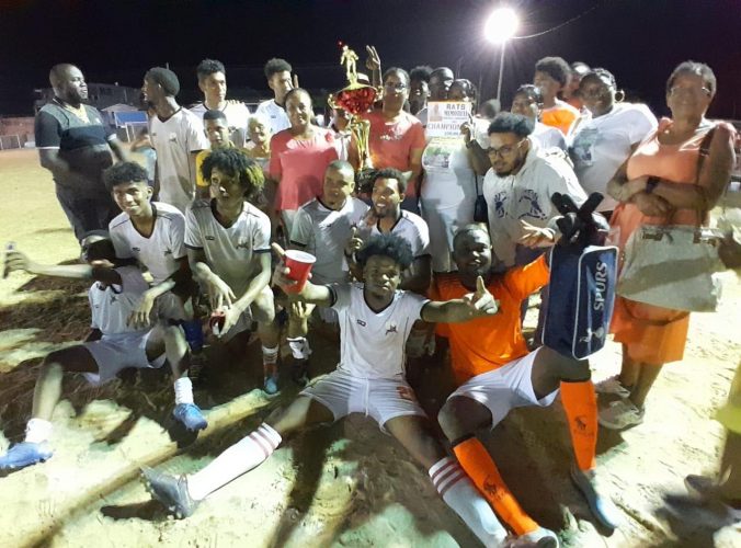 Beacons celebrate after winning the ‘Rats’ Memorial Football Championship.