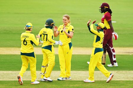 BRISBANE, Australia, CMC – Head coach Shane Deitz believes West Indies Women’s capitulation in the opening One-Day International against Australia Women, will serve as a learning curve for the young side.
West Indies Women were bundled out for just 83 at Allan Border Field – their lowest-ever ODI total against the Aussies and their joint seventh lowest of all time.
Australia comfortably chased down the target to win by eight wickets, and take a 1-0 lead in the three-match series.
“Funny enough, I thought some of the things we did were really good. We sent some youngsters out to give them an opportunity and they did their best,” said Deitz, in his first series with the Caribbean side after being appointed in July.
“They’re learning international cricket so they’ve got a lot to learn, and obviously when you have a loss, it’s a great opportunity to learn more so plenty of learnings to go on.
“We’ve got a few days between now and the next game so [we have a] fair bit to do.
“I know the result looks really, really bad but I think we’re here to learn, especially those youngsters.
“In these conditions against the world’s best, it is a perfect opportunity to learn great things and next time when they come here, we’ll be better prepared for these conditions with the younger players a bit older.”
West Indies Women were hampered by the loss of captain and leading batsman Hayley Matthews who missed the game with a leg injury.
Her absence resulted in the teenaged pair of Zaida James and Djenaba Joseph opening the batting, a partnership exploited by the Aussies as both perished cheaply, West Indies Women slipping to five runs for three wickets after being sent in.
Aaliyah Alleyne was the only one to pass 20, top-scoring with 35 from 39 deliveries before she was last out.
Despite the batting meltdown, Deitz said he saw encouraging signs from a technical perspective.
“Just the movement into the ball, we worked on some technical things with the bat and just getting into the ball more and committing to trying to take the opposition on,” said the Australian. “It starts with your movement and your thought processes which I thought were good so that was quite pleasing, and that’s what’s going to hold us in good stead moving forward.”
Matthews was the leading scorer in the preceding Twenty20 series, scoring a hundred and two half-centuries to finish with 313 runs and top the aggregates on either side.
And Deitz said with the second ODI scheduled for Thursday in Melbourne, Matthews would be afforded the time to further recover.
“She’s in recovery mode at the moment,” he explained. “She was reasonably close to playing today but there’s a few days between now and the next game so it gives us a bit more time to heal and let her try to be as close to a hundred per cent as she can be.
“It’s pretty tough if you’re trying to play on one leg. Mentally you’re not right up for it. We’ll see how it goes [over the] next few days.”
