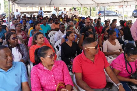 A section of the audience present at the signing yesterday at Friendship on the East Bank of Demerara. (Ministry of Public Works photo)