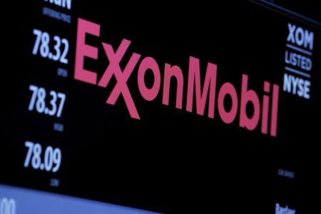 FILE PHOTO: The logo of Exxon Mobil Corporation is shown on a monitor above the floor of the New York Stock Exchange in New York, December 30, 2015.  REUTERS/Lucas Jackson/File Photo