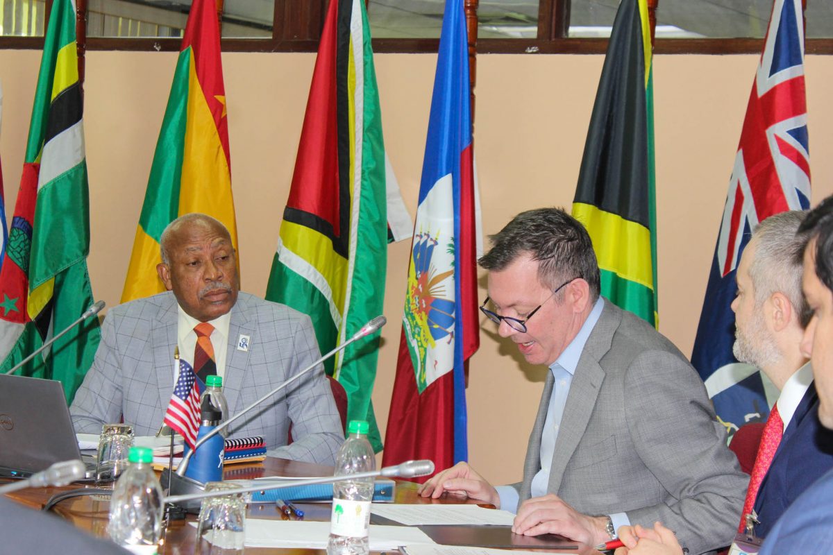 Dominica’s Ambassador to CARICOM Felix Gregoire (left) and Deputy United States Trade Representative Jayme White during the meeting. (US Embassy photo)