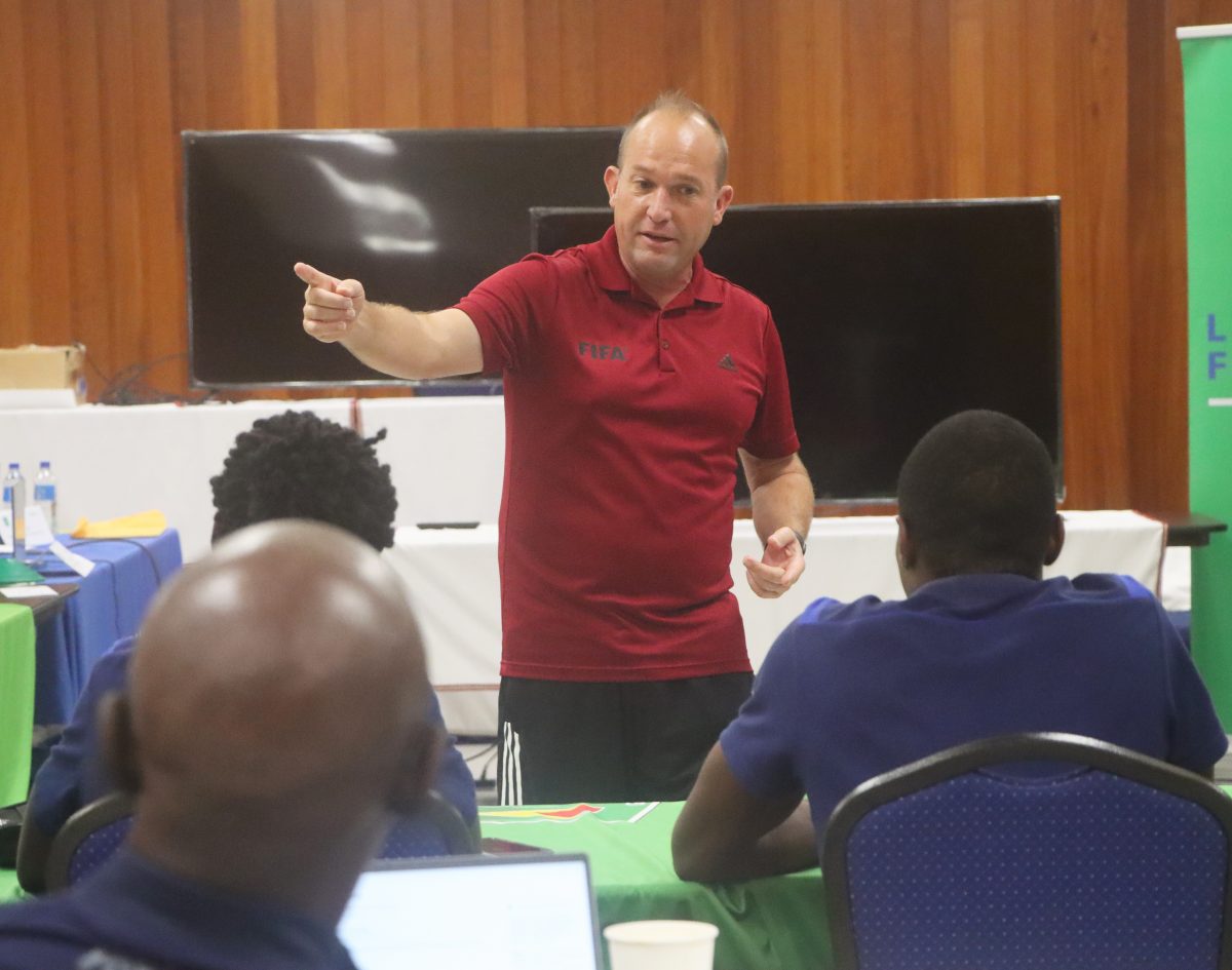 FIFA Referee Shane Butler explained a point to the 
gathering during the opening day of the FIFA Futsal Workshop
