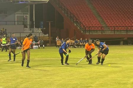 Action in the Woodpecker Products women’s league between GBTI/GCC (Blue) and Saints.