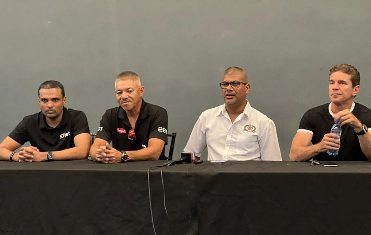 (from left) E-Net’s Vishok Persaud, Kevin Jeffrey, GMRSC President Mahendra Boodhoo and Mark Vieira at the “Clash-of-Champions” press conference yesterday at the GMRSC headquarters, Cosmos building