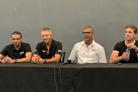 (from left) E-Net’s Vishok Persaud, Kevin Jeffrey, GMRSC President Mahendra Boodhoo and Mark Vieira at the “Clash-of-Champions” press conference yesterday at the GMRSC headquarters, Cosmos building