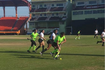 The GBTI/GCC Ladies (in white) strolled to a 2-0 win over the Woodpecker Hikers women’s team yesterday at the Providence National Stadium.