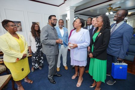 President Irfaan Ali (third from left) meeting with members of the delegation on Friday at State House