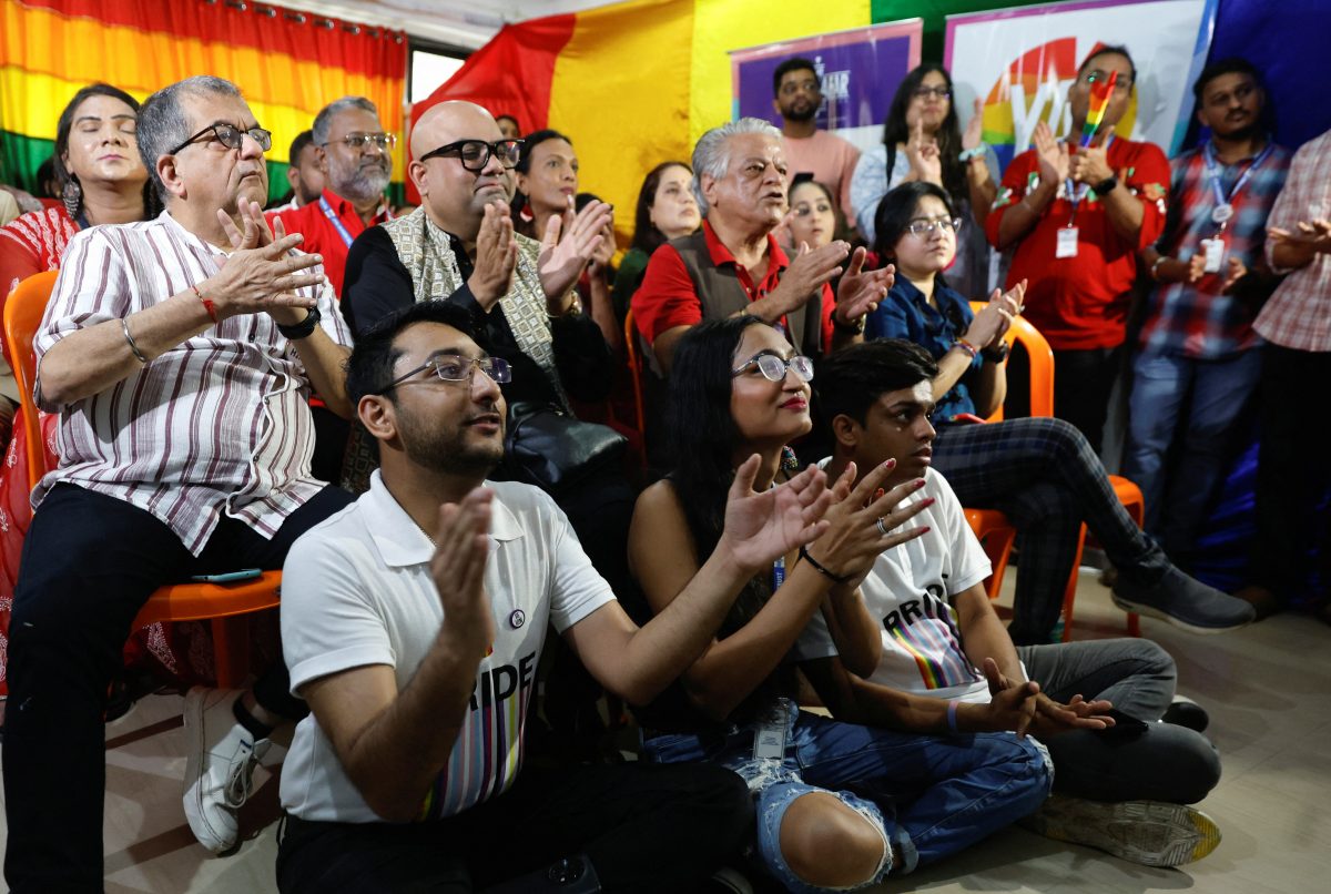 Members of the lesbian, gay, bisexual and transgender community (LGBT community) watch the judgement on same-sex marriage by the Supreme Court on a screen at an office in Mumbai, India October 17, 2023. REUTERS/Francis Mascarenhas