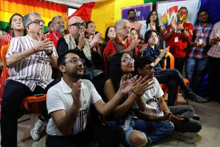 Members of the lesbian, gay, bisexual and transgender community (LGBT community) watch the judgement on same-sex marriage by the Supreme Court on a screen at an office in Mumbai, India October 17, 2023. REUTERS/Francis Mascarenhas