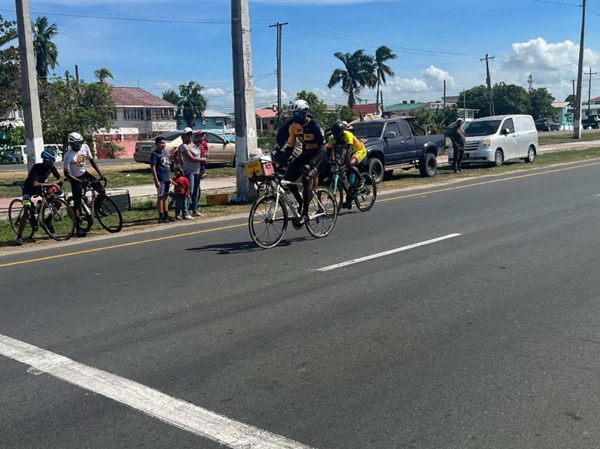 James Joelyn Joseph crosses the finish line ahead of Junior Niles to win the Veterans Over-50 race.
