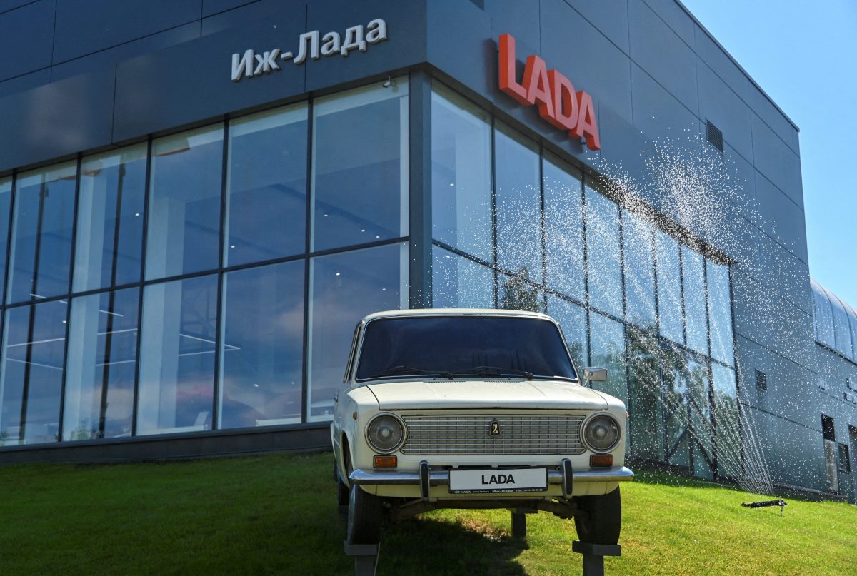 FILE PHOTO: A Soviet-made retro VAZ-2101 car is on display in front of a showroom of Izh-Lada dealership in the city of Izhevsk, Russia August 19, 2022. REUTERS/Alexey Malgavko//File Photo