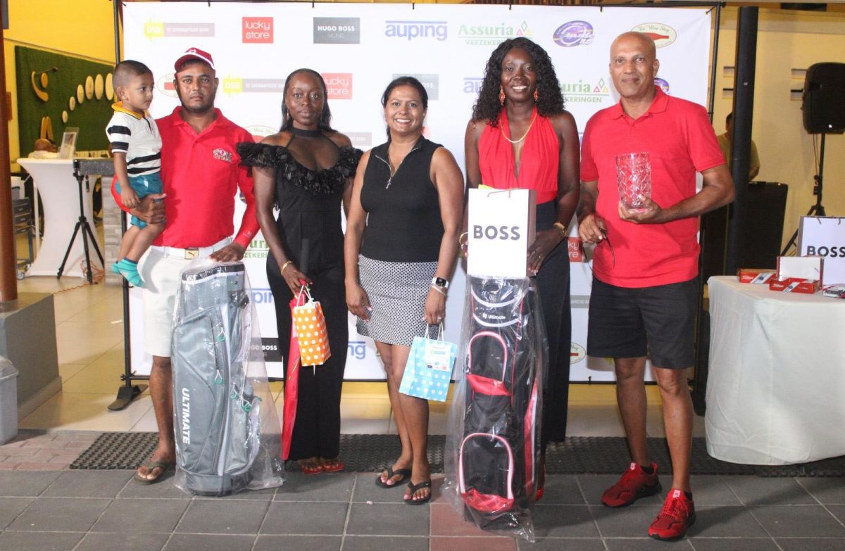 Some members of the Guyana team with their prizes.
