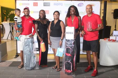 Some members of the Guyana team with their prizes.
