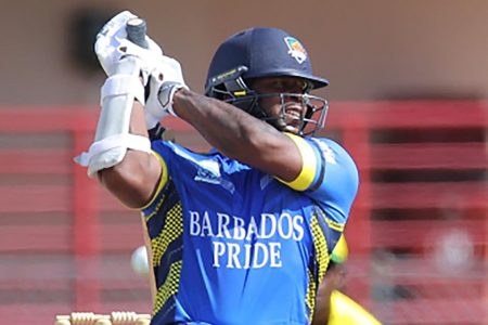 Left-hander Kyle Mayers hits through the off-side during his hundred against Windward Islands Volcanoes yesterday. (Photo courtesy CWI Media) 