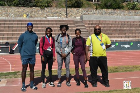 Track athletes, Emanuel Archibald, Jasmine Abrams, Keliza Smith, Aliyah Abrams and Coach, Johnny Gravesande posed for a photo yesterday following a practice session. 