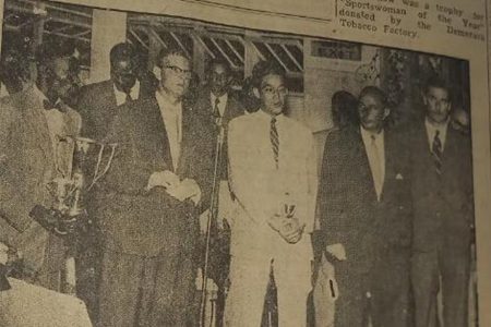 FLASHBACK! British Guiana’s Sportsman-of-the-Year winners
Clem Fields and Dereck Phang pose with their trophies along with R. D
Nelson, General Manager of Shell and Regent Petroleum Distributors
(W.I) Limited and representatives of Petroleum Marketing Agencies
Limited at the Woodbine Hotel in January of 1955.
