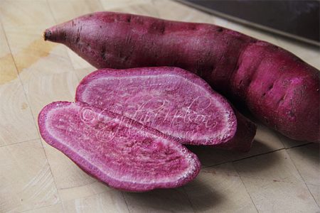 Purple-flesh sweet potatoes scrubbed and ready for cooking (Photo by Cynthia Nelson)
