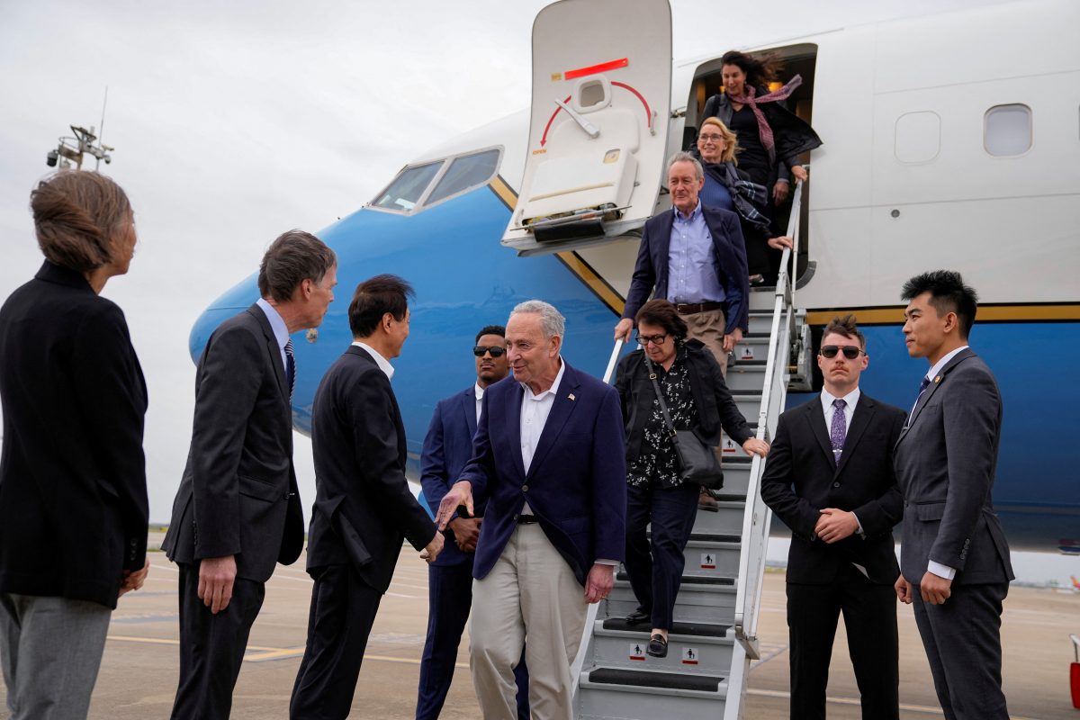 U.S. Senate Majority Leader Chuck Schumer (D-NY), and other members of the delegation arrive at Shanghai Pudong International Airport in Shanghai, China October 7, 2023. REUTERS/Aly Song/Pool