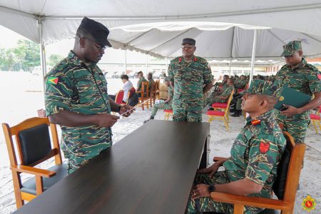 Lieutenant Colonel Lloyd Souvenir taking the oath (GDF photo)