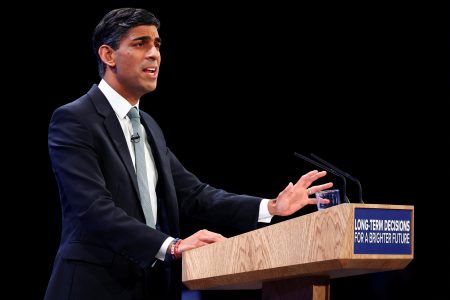 British Prime Minister Rishi Sunak speaks on stage at Britain's Conservative Party's annual conference in Manchester, Britain, October 4, 2023. REUTERS/Toby Melville