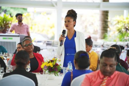 A teacher making her point to the president