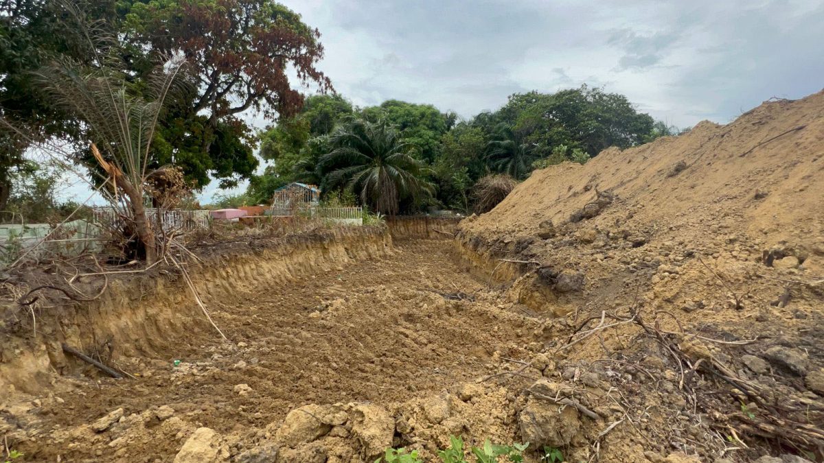 The area that was excavated with tombs evident