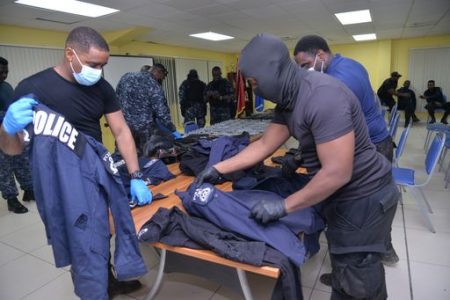 Trinidad cops examining the find.
