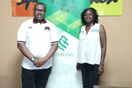 Petra Organization Co-Director and tournament organizer Troy Mendonca (left) and tournament coordinator Lavern Fraser-Thomas pose for a photo opportunity at the conclusion of the Pee Wee Football quarterfinal press conference on Wednesday