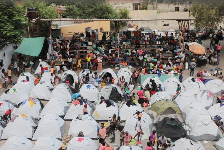 FILE PHOTO: People fleeing gang violence take shelter at a sports arena, in Port-au-Prince, Haiti September 1, 2023. REUTERS/Ralph Tedy Erol/File Photo