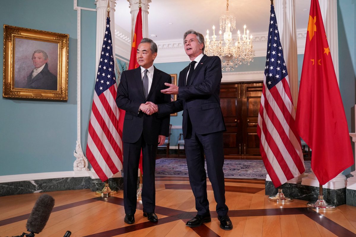 U.S. Secretary of State Antony Blinken shakes hands with Chinese Foreign Minister Wang Yi as they meet at the State Department in Washington, U.S., October 26, 2023. REUTERS/Sarah Silbiger