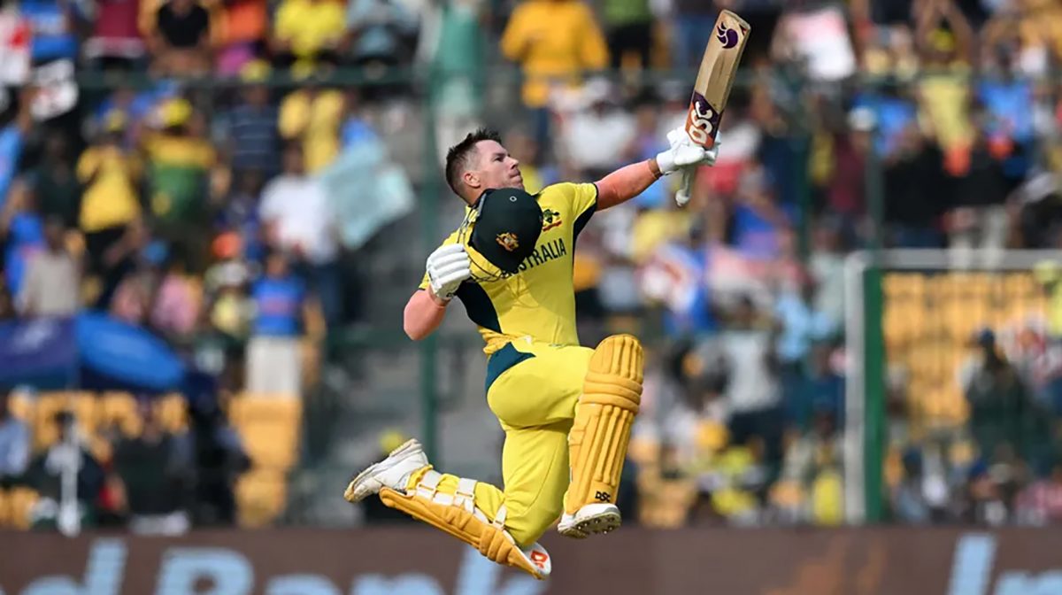 David Warner leaps for joy after reaching three figures yesterday
