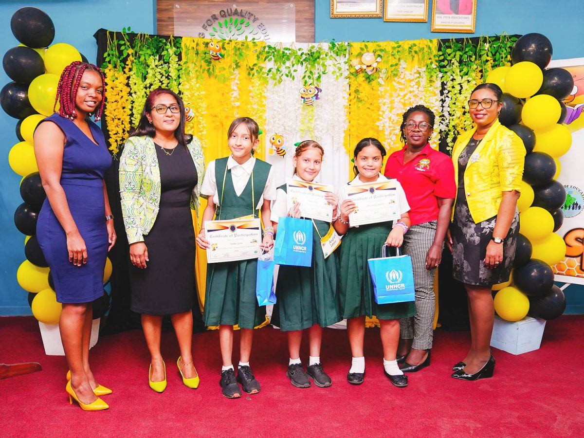 The winners with Education Ministry officials (Ministry of Education photo)
